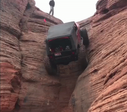 Jeep Climbing A Cliff GIF