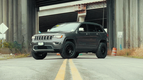 Jeep In The Middle Of Road GIF