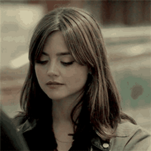 Jenna Coleman Stare With A Smile GIF