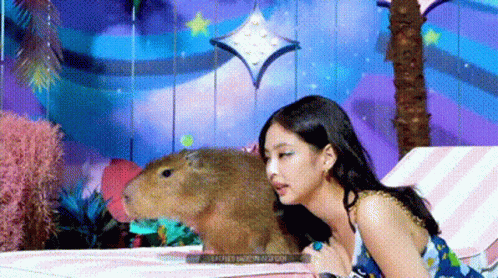 Jennie Imitating Capybara Meme GIF