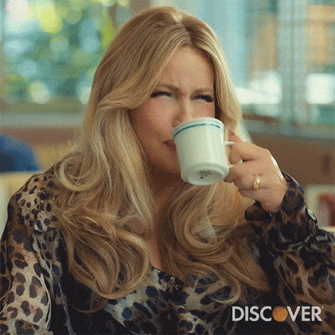 Jennifer Coolidge Drinking From A Mug GIF