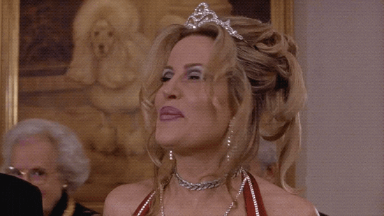 Jennifer Coolidge Wearing A Tiara And Nodding GIF