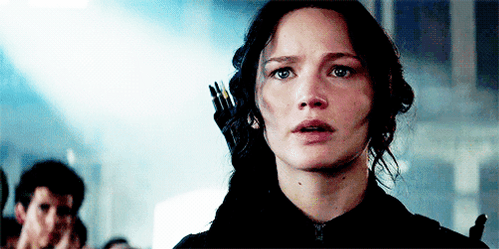 Jennifer Lawrence Trying Not To Cry In Hunger Games GIF