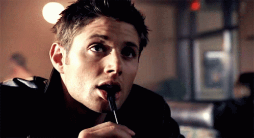 Jensen Ackles American Actor Bite Pen Smile GIF