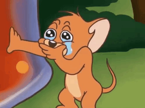 Jerry From Tom And Jerry Is Crying While Holding A Bottle Of Tomato Juice In His Mouth . GIF