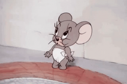 Jerry From Tom And Jerry Is Wearing A Diaper And Smiling . GIF