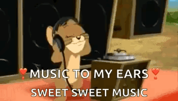 Jerry From Tom And Jerry Is Wearing Headphones And Listening To Sweet Sweet Music . GIF