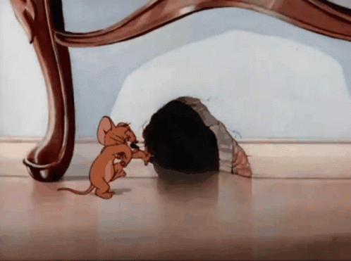 Jerry Mouse Rejoicing As He Enters Hole GIF