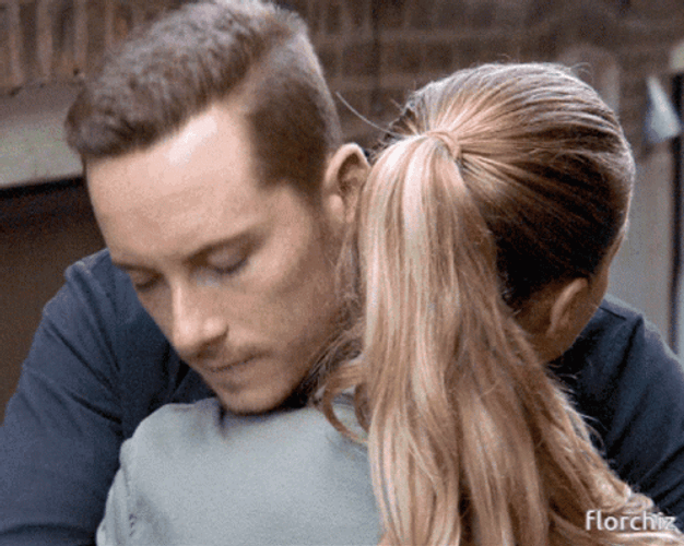 Jesse Lee Soffer And Tracy Spiridakos Comfort Hugs GIF