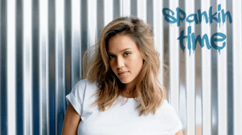 Jessica Alba Winking While Showing Kiss GIF