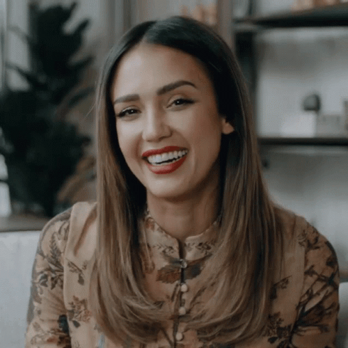 Jessica Alba Giggles While Holding Hair GIF