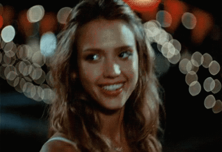Jessica Alba Smiling While Bumped Pole GIF