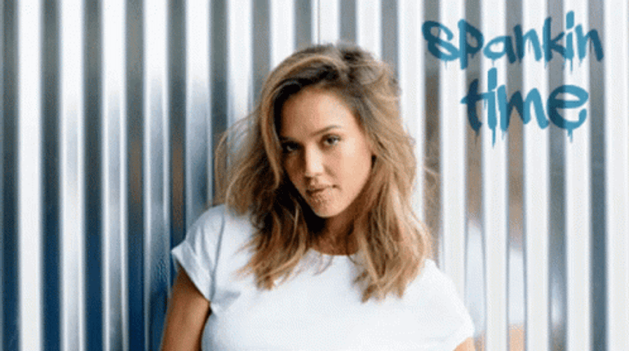 Jessica Alba Winking While Showing Kiss GIF