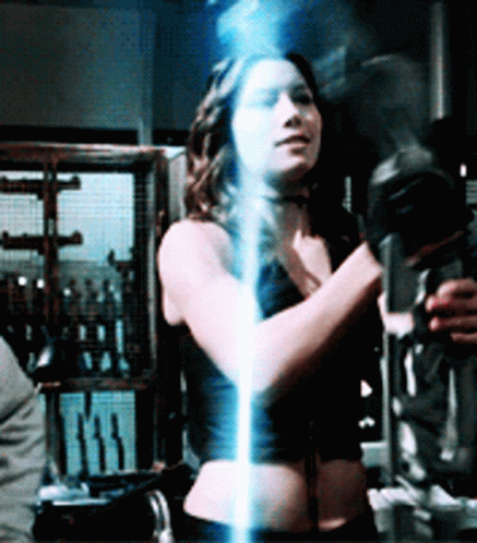 Jessica Biel Holding A Modern Bow GIF
