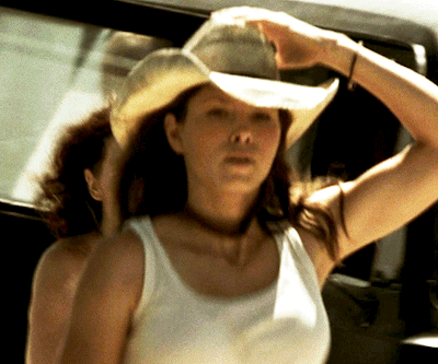 Jessica Biel Holding Her Cowboy Hat While Running GIF