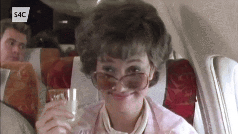 Jessica Lange Holding Prosecco Waving GIF