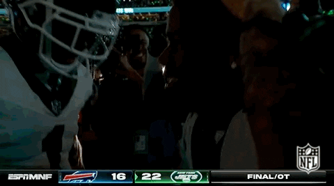 Jets Players Hugging One Another GIF
