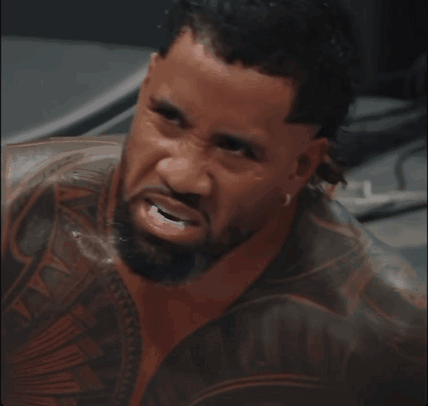 Jey Uso Crouching Down GIF