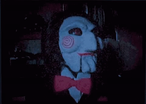 Jigsaw Saw Turning Head GIF