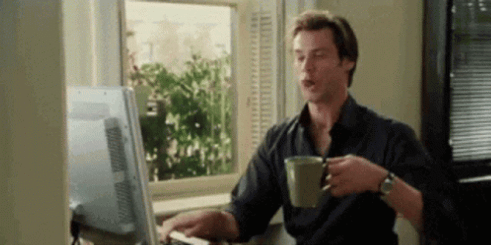 Jim Carey Typing Fast Drinking GIF
