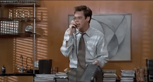 Jim Carrey Fletcher Reede Throwing Phone GIF