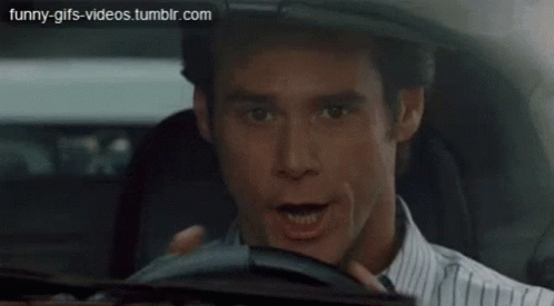 Jim Carrey Moving Car Traffic By Fingers GIF