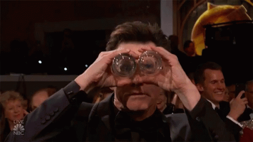 Jim Carrey Using Glasses As Binoculars GIF
