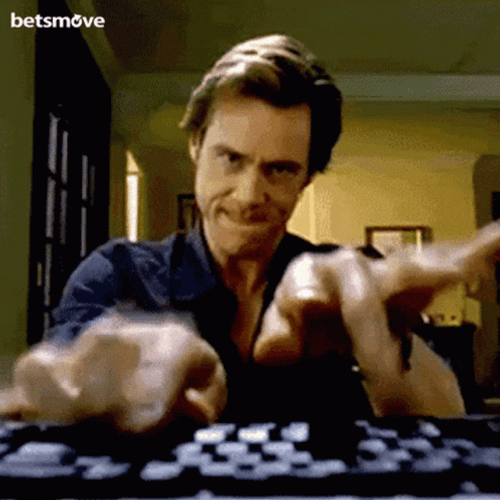 Jim Carrey Working Hard GIF