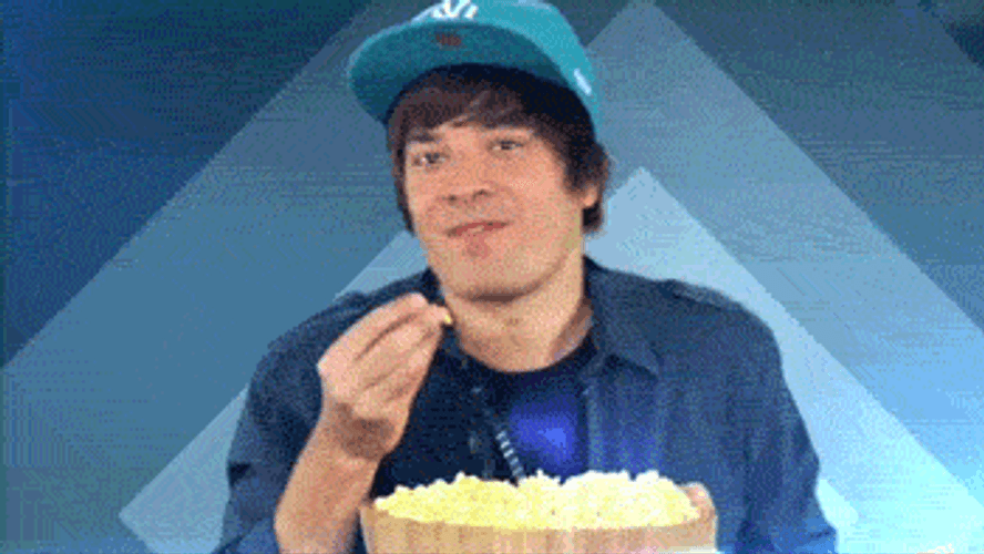 Jimmy Fallon Eating Popcorn Justin Bieber Meme GIF