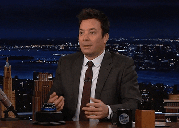 Jimmy Fallon Trying Not To Laugh GIF