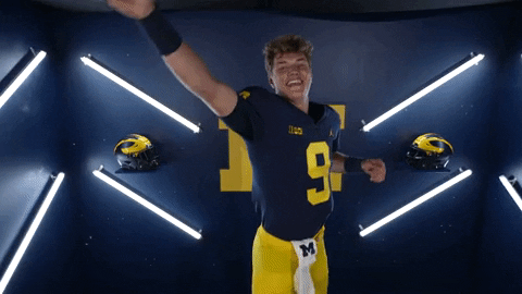 Jj Mccarthy Jumping And Waving Hand GIF