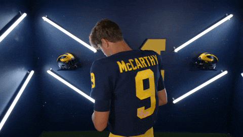 Jj Mccarthy Smiling While Holding Football GIF