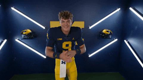 Jj Mccarthy Waving Hands Upwards GIF