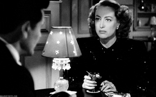 Joan Crawford Annoyed Tossing Drink GIF