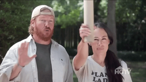 Joanna Gaines Looking Through Rolled Papers GIF