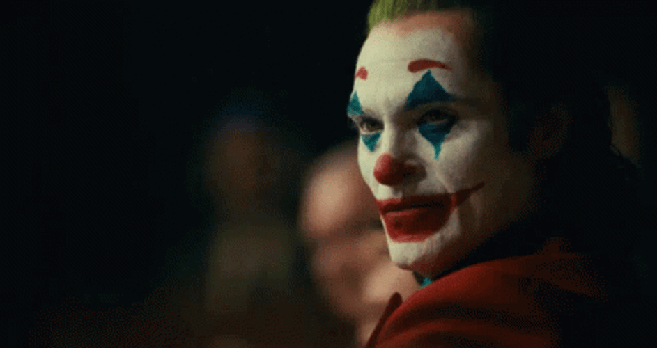 Joaquin Phoenix Joker Evil Grin GIF