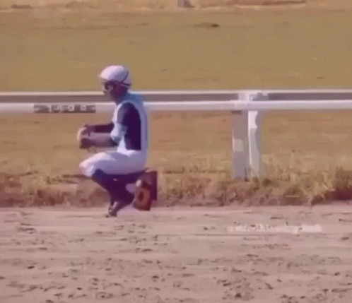 Jockey Jumping Over Fence GIF