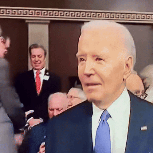 Joe Biden Falling Playful Smile GIF