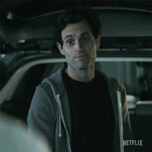 Joe Goldberg Shaking Head Smile GIF
