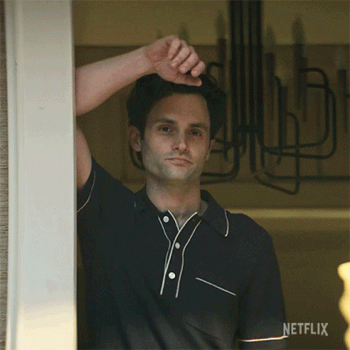 Joe Goldberg Waving Hand Raising Eyebrows GIF
