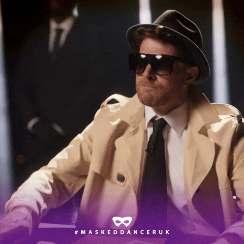 Joel Dommett Looking For Clue Magnifying Glass GIF