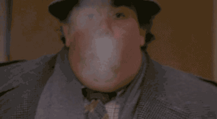 John Candy Blowing Smoke GIF