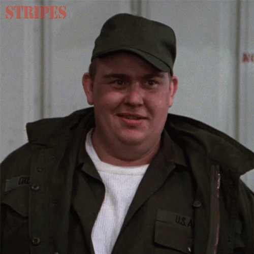 John Candy Confused In Stripes GIF