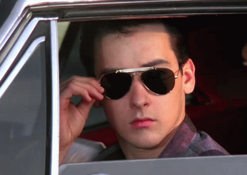 John Cusack Remove Sunglasses And Wink Wink GIF