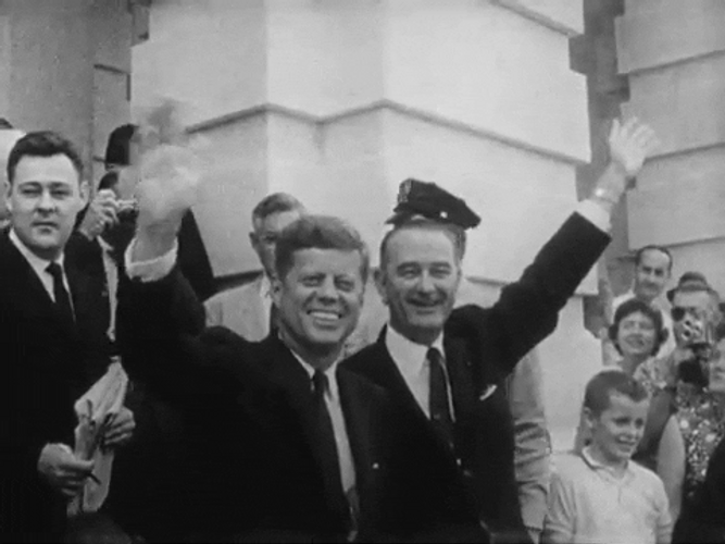 John F. Kennedy And Johnson Raising Hands GIF