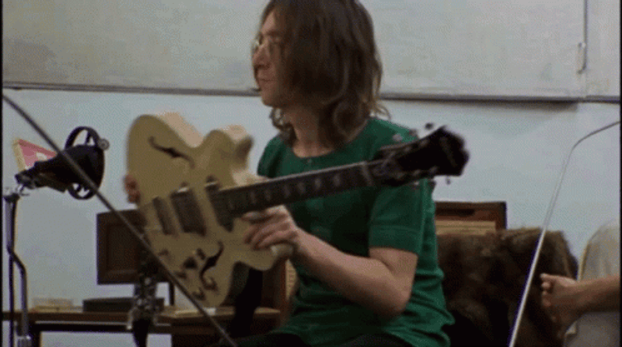 John Lennon Shaking Guitar GIF
