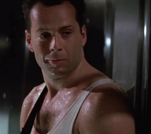 John Mcclane Weak Smile Die Hard GIF