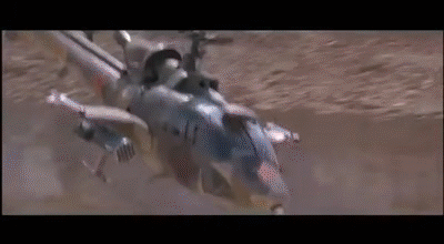 John Rambo Aims Bow And Arrow To Helicopter GIF