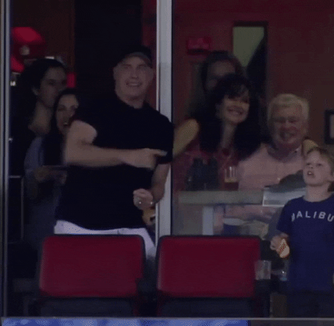 John Travolta With People Dancing Behind GIF