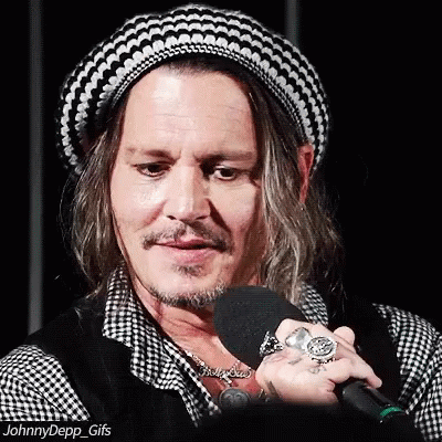 Johnny Depp Holding Microphone Wearing Hat GIF